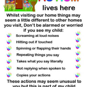 A child with Autism Lives here poster LAMINATED